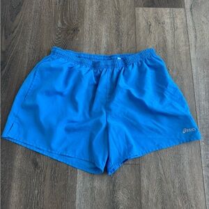 ASICS Women’s athletic shorts.  Blue. Size large. Great used condition!